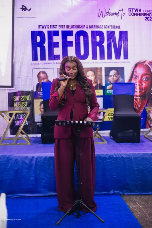 The speaker at the lectern on the Reform conference stage